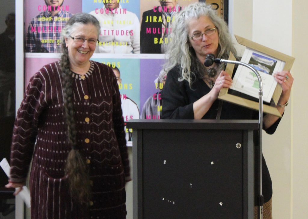 “Pictured left to right, Anne Woiwode, Chair of the Sierra Club Michigan Chapter, presents the 2019 White Pine Award to Kathleen Heideman of the Mining Action Group. Photograph provided by the Sierra Club Michigan Chapter.” Download this photo.